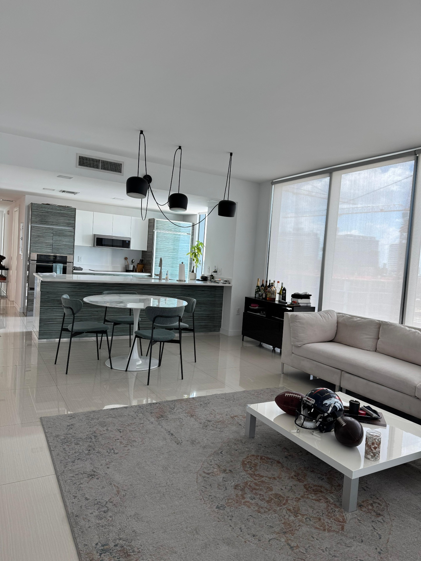 Open-plan living room left spotless by T&S Cleaning in a Palm Beach County home